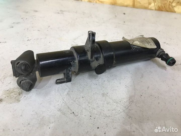 Форсунка омывателя фар передняя левая