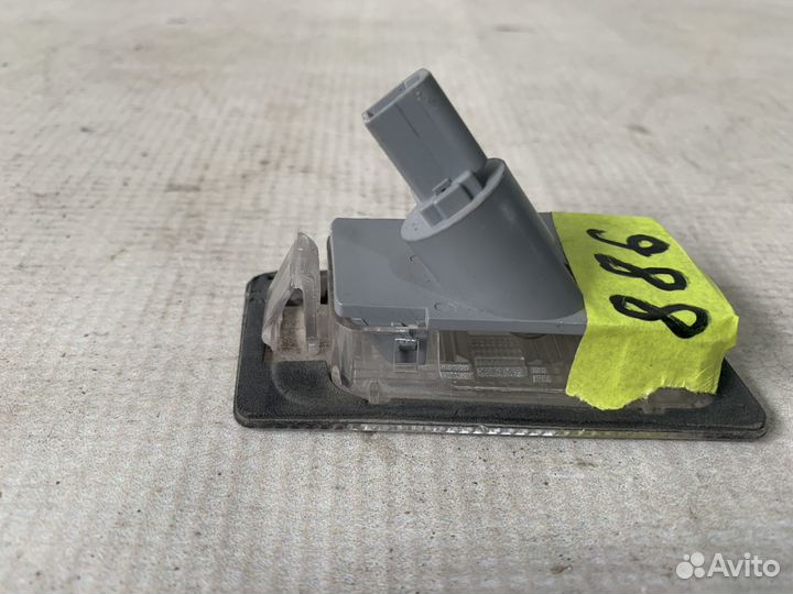 Kia Cerato 13-Фонарь подсветки номера левый