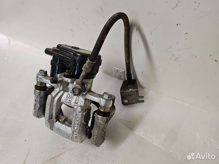 Суппорт тормозной задний левый Hyundai Sonata DN8