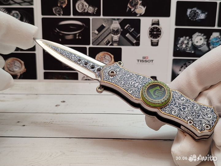 Нож складной спинер