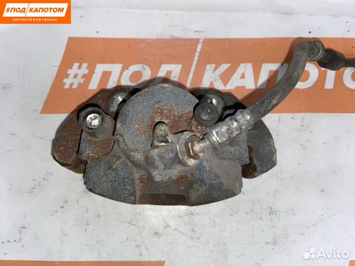 Суппорт тормозной передний левый Mazda 3 BK рест