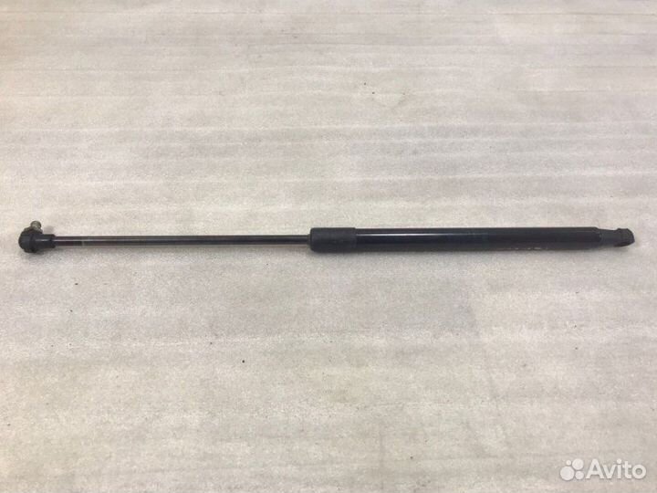 Амортизатор двери багажника Лада Гранта 2011