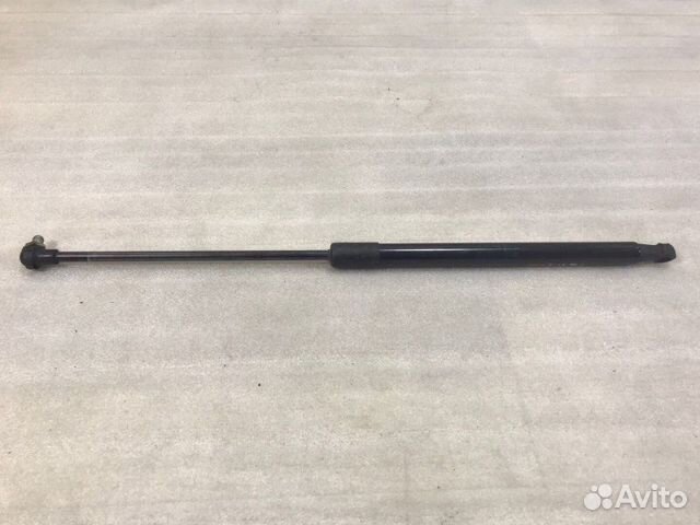 Амортизатор двери багажника Лада Гранта 2011