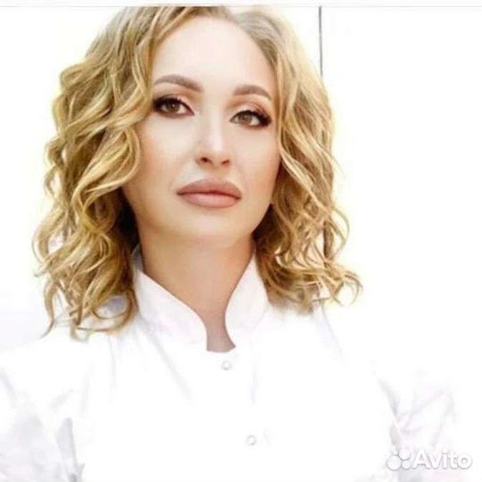 Врач косметолог
