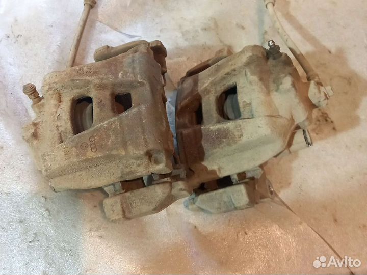 Суппорт тормозной передний VW Tiguan 1