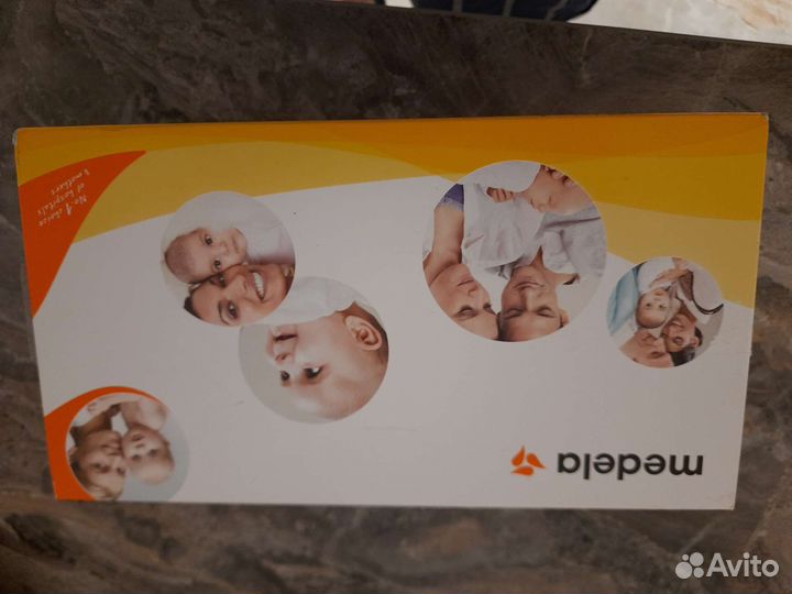 Молокоотсос medela ручной