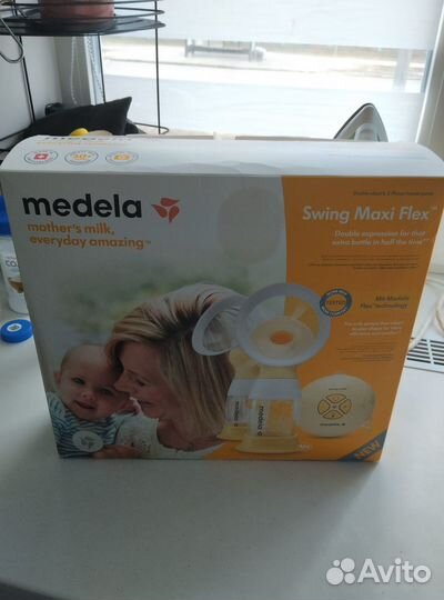 Молокосос Medela Swing Maxi Flex двойной