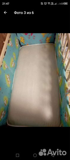 Детская кроватка с маятником