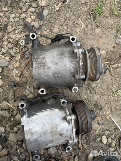 Компрессор кондиционера Mitsubishi Lancer Cedia