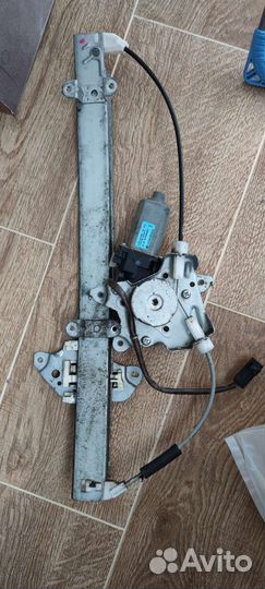 Водительский стеклоподъёмник Nissan Almera Classic