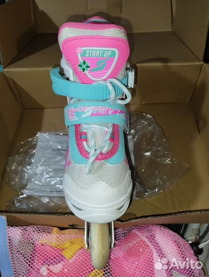 Роликовые коньки