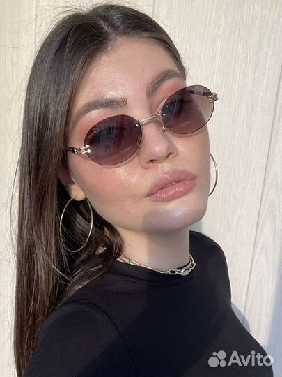 Овальные солнцезащитные очки Cartier