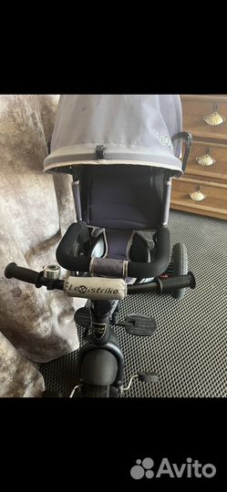 Детский велосипед с ручкой