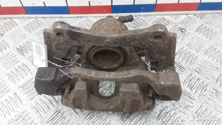 Суппорт передний правый Toyota Corolla Verso рест