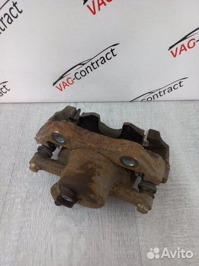 Суппорт тормозной передний правый Volkswagen Polo