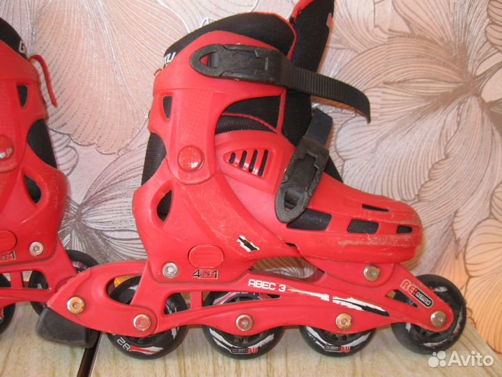 Роликовые коньки