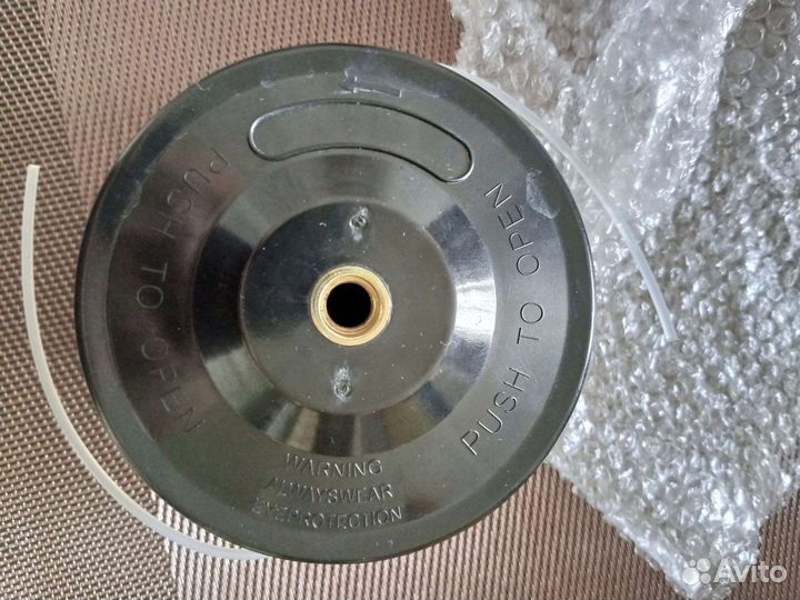 Головка с леской для триммера