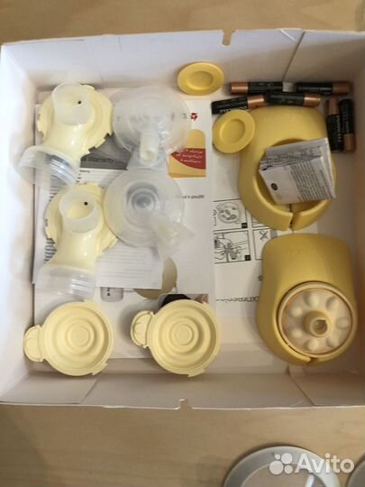 Молокоотсос medela swing maxi