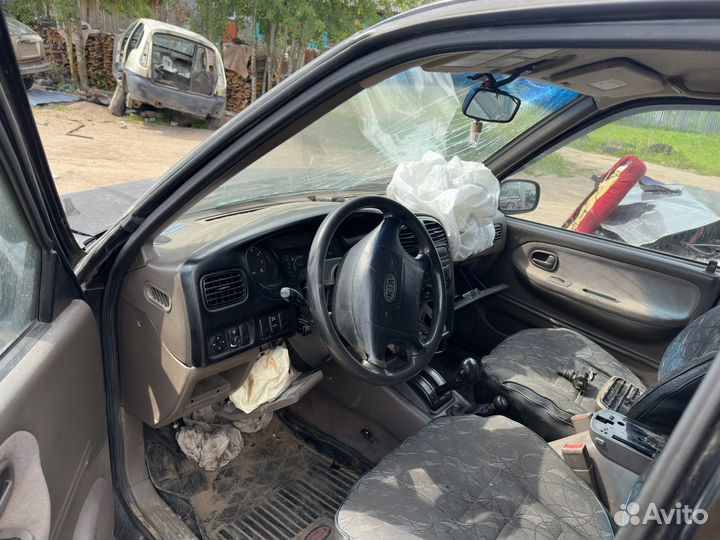 В разборе KIA Sportage FE 2.0 16V АКПП 2002г