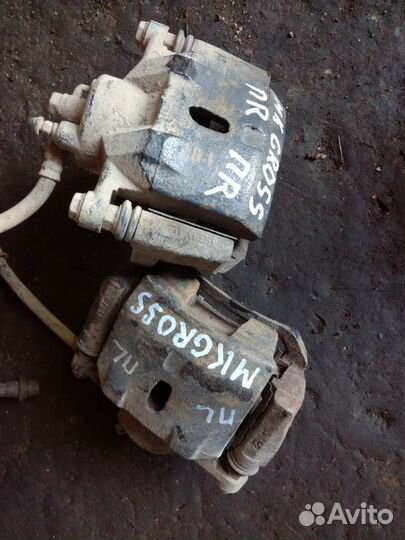 Суппорт тормозной передний Geely MK Cross