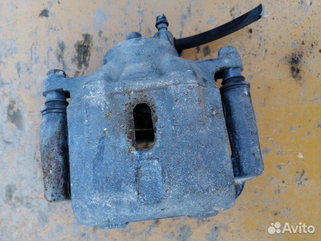 Суппорт передний левый Toyota Probox NCP51 1NZ