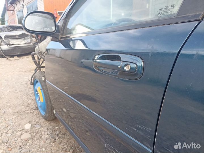 Дверь передняя левая Chevrolet Lacetti