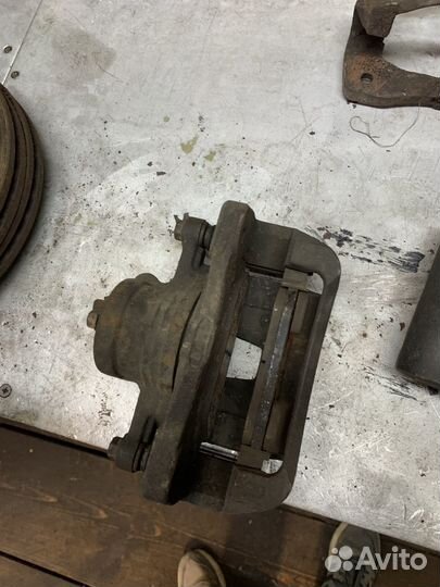 Суппорта передние lacetti