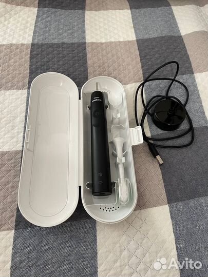 Электрическая зубная щетка Philips