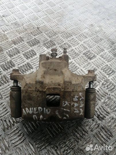 Суппорт передний левый Mitsubishi Lancer CY 1.8