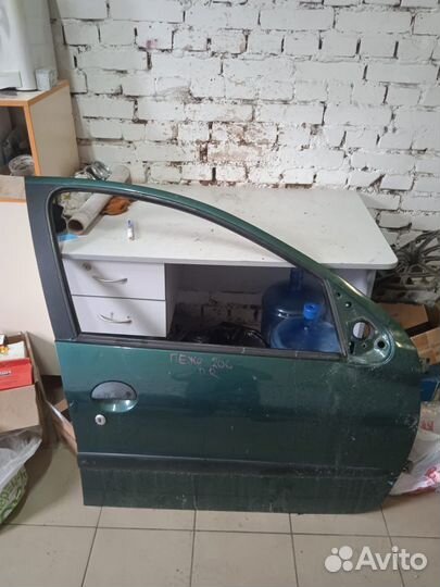 Дверь передняя Peugeot 206