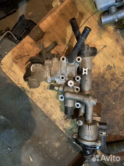 Корпус термостата для hyundai santa fe 4 (TM)