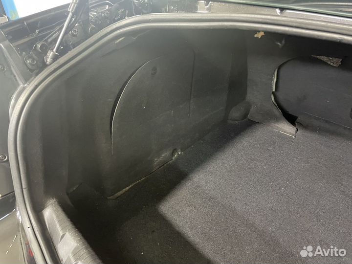 Обшивка багажника Opel Astra H седан