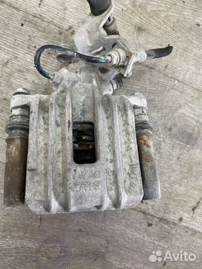 Суппорт тормозной задний левый seat Toledo