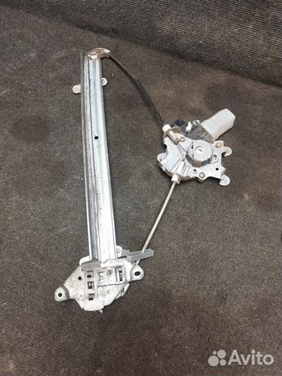 Стеклоподъемник левый передний лансер 9