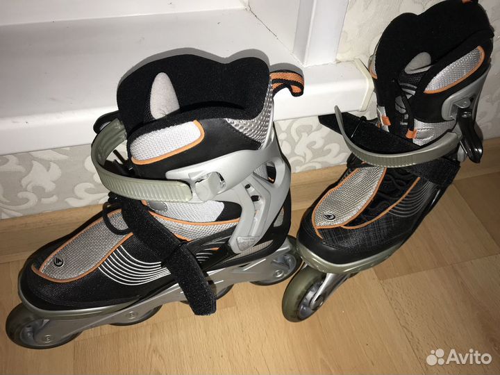 Роликовые коньки