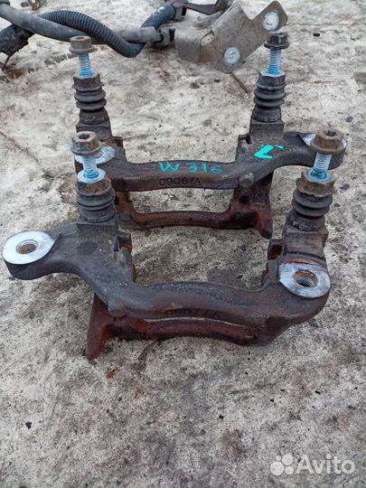 Скоба заднего суппорта от Ниссан Кашкай J11