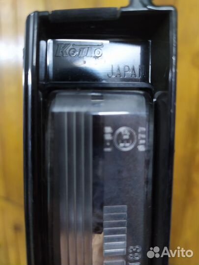 Фонарь освещения номерного знака