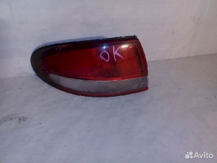 Фонарь (стоп сигнал) задний левый 043-1410Б белый