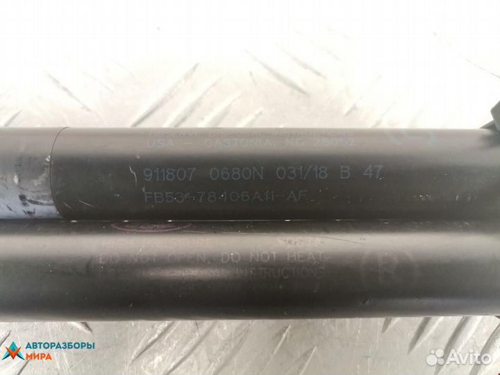 Амортизатор крышки багажника (3-5 двери) Ford