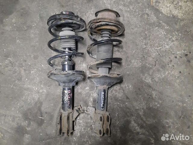 Передняя стойка амортизатора nissan maxima a32