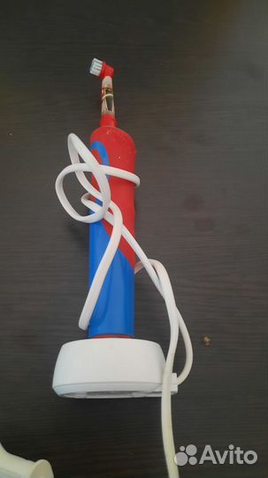 Электронная зубная щетка