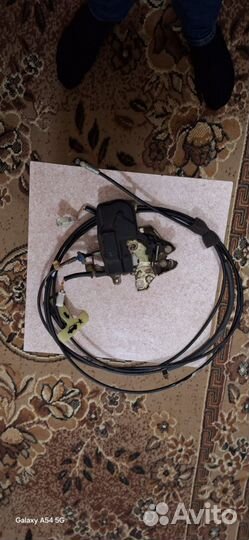 Замок крышки багажника