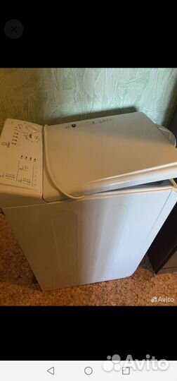 Стиральная машина с вертикальной загрузкой