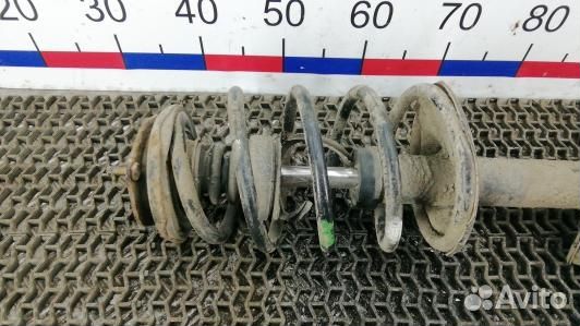 Стойка передняя левая nissan almera N16 (HDN05K501