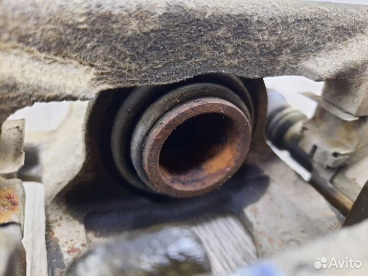 Суппорт тормозной задний правый Tiida Juke Qashqai