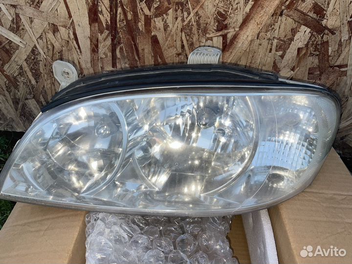 Фара левая передняя Kia spectra