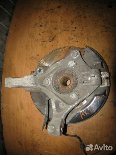 Кулак поворотный передний левый Opel Astra J