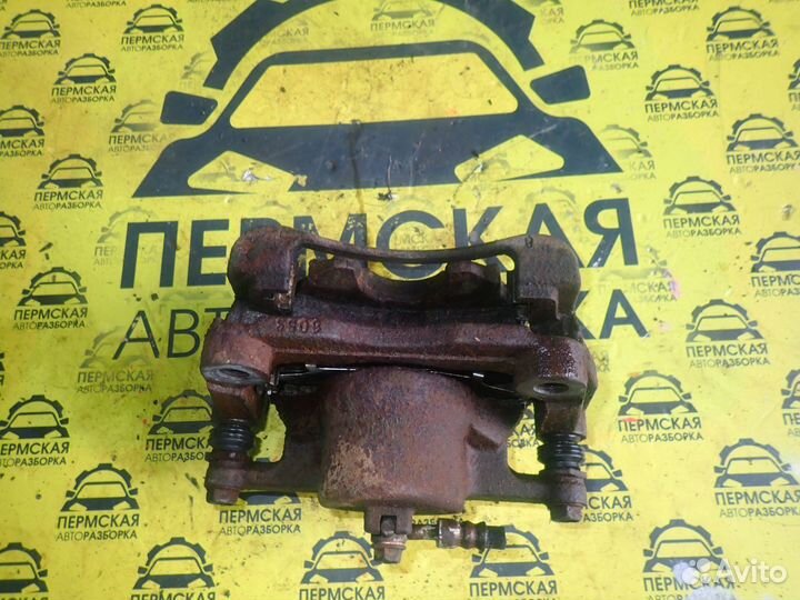 Суппорт передний левый Nissan Qashqai J10