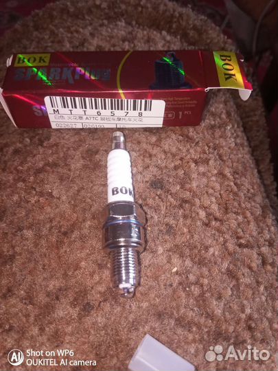 Свеча зажигания на скутер