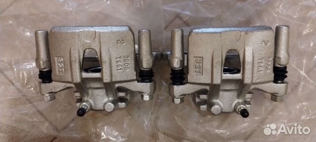 Тормозные суппорта задние, новые